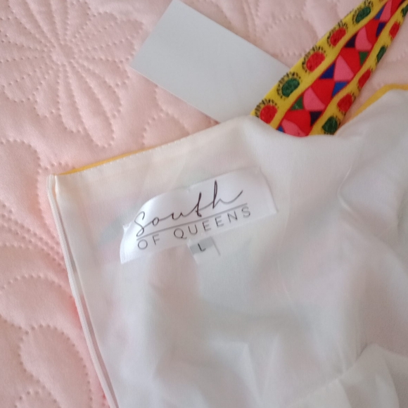 A beautiful dress ,still with the tag on... - Picture 5 of 8